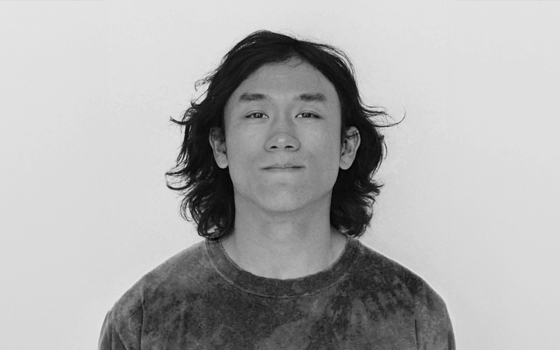 Headshot of Dr. Lucas Tian in black and white