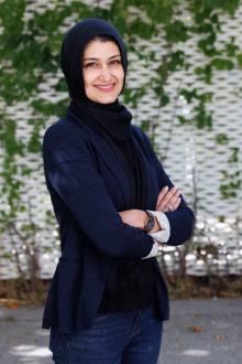 Sumaira Zamurrad standing and smiling